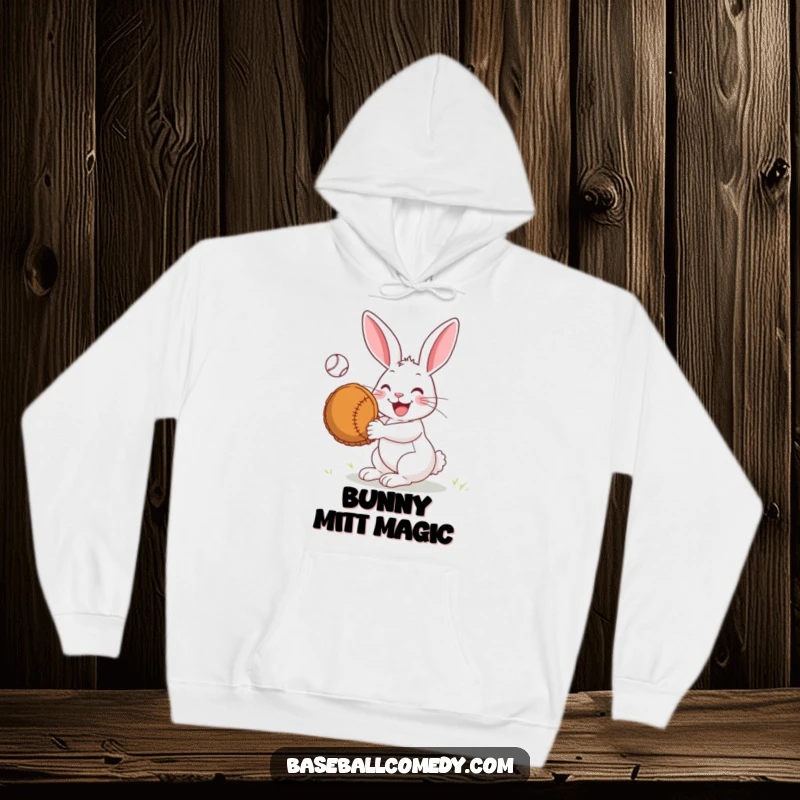 Funny Hoodie: A joyful rabbit is illustrated catching a baseball with a comically oversized mitt, radiating happiness.