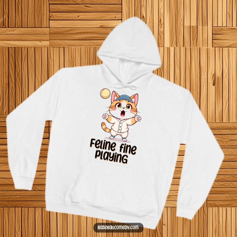 Funny cat in a baseball uniform, eyes wide with surprise, catching a fly ball, depicted on a soft hoodie.