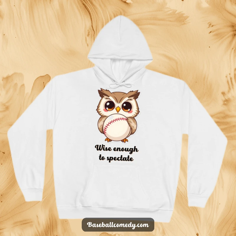 Funny hoodie with a very curious owl sporting wide eyes, captivated by a baseball, showcasing a humorous design.