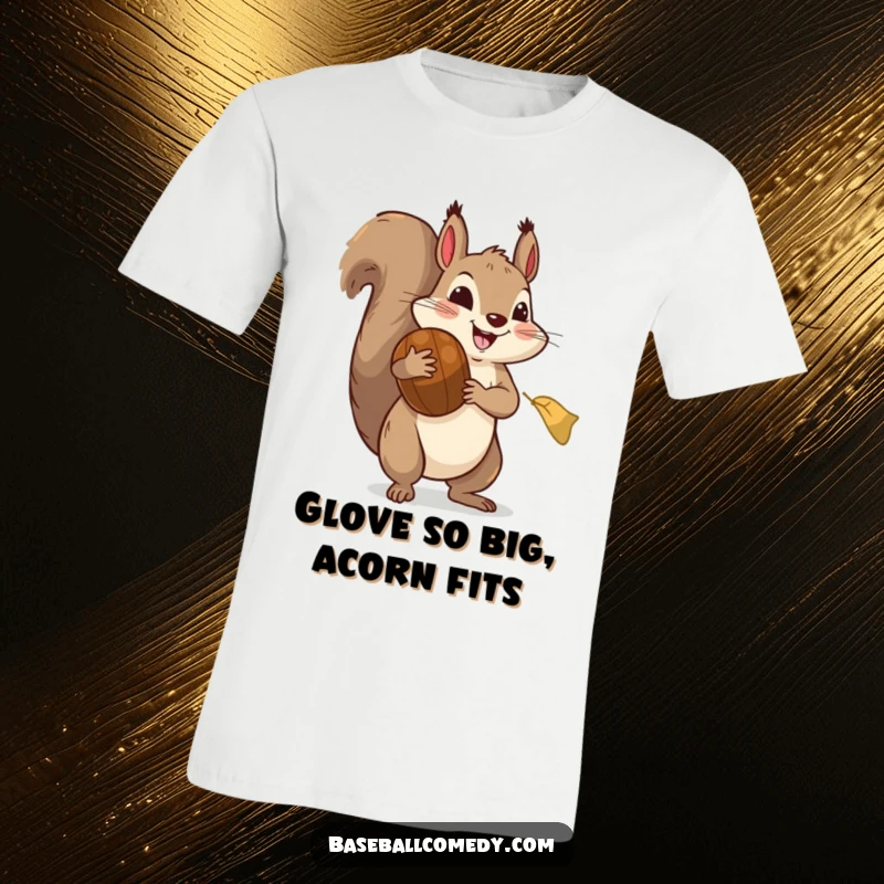 Funny t-shirt: A smiling squirrel in oversized baseball gear triumphantly catches a giant acorn, a scene of comic sports action.