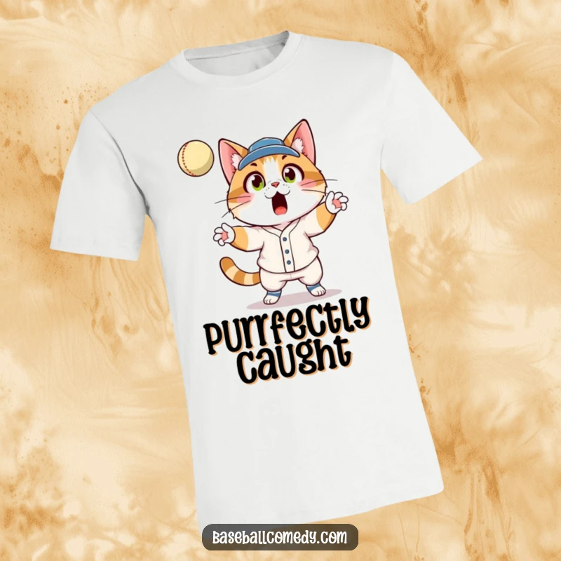 Funny cat in baseball uniform, surprised face, catching a fly ball with paws, printed on a humorous t-shirt.