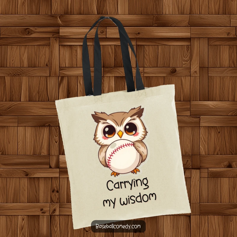 Funny tote bag with a curious owl showing wide eyes, intently focused on a baseball, a humorous accessory.